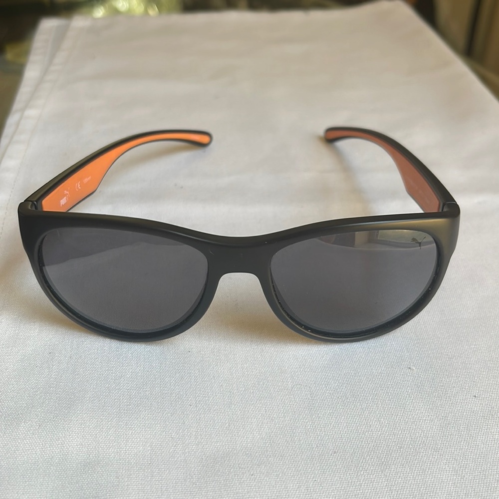 PUMA POLARIZED PU15149 54 17 135 Sport black/orange plastic frames, gray lenses
